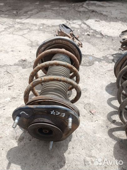 Передняя левая стойка Geely Emgrand EC7