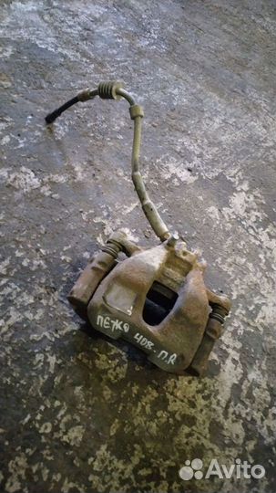 Суппорт тормозной передний правый Peugeot 408 201