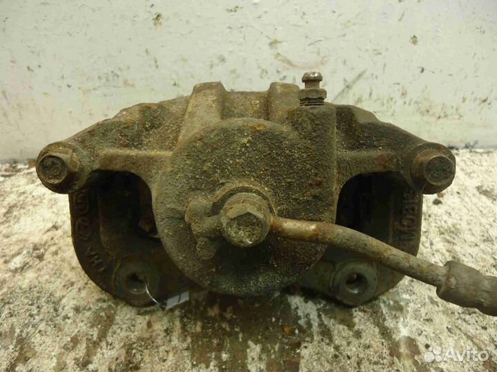 Суппорт передний правый Hyundai Tucson 2 LM