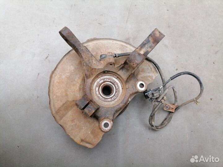 Кулак поворотный пер. левый Mitsubishi Lancer IX