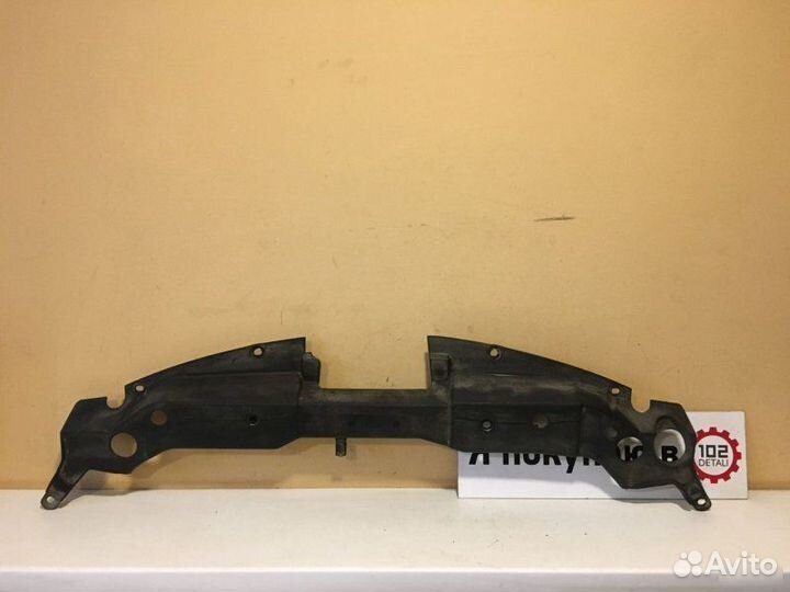 Кожух замка капота Nissan Tiida C11