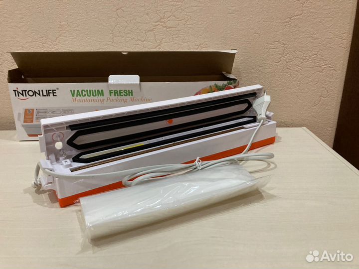 Вакуумный упаковщик
