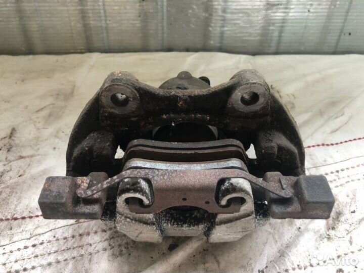 Суппорт тормозной задний левый Mercedes-Benz