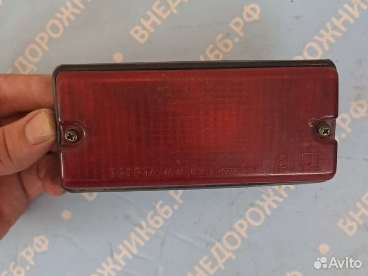 Фонарь противотуманный задний Land Cruiser 80