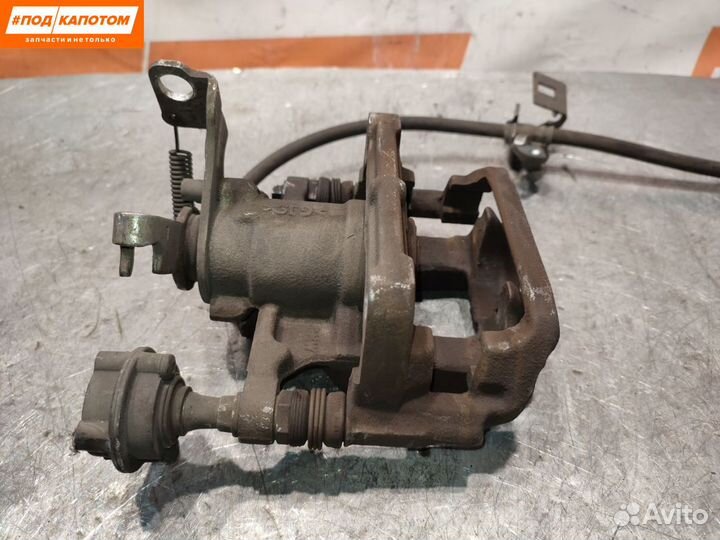 Суппорт тормозной задний левый Chevrolet Cruze