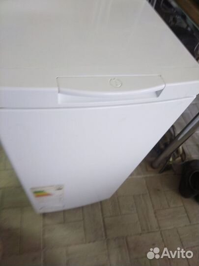 Стиральная машинка с вертикальной загрузкой