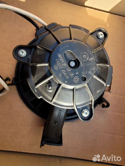 Моторчик отопителя Opel Astra J