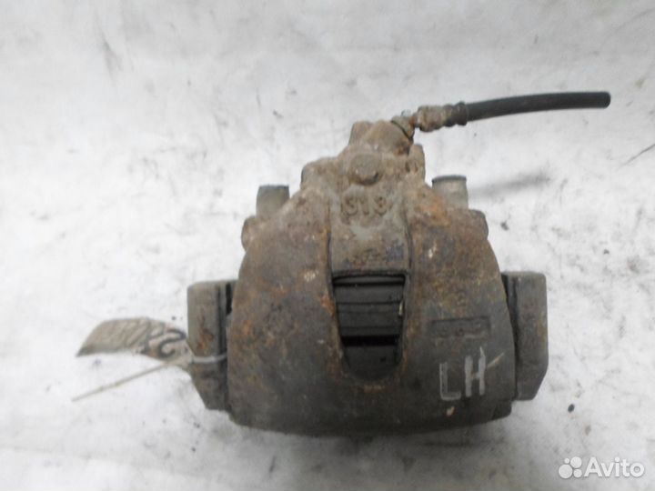 Суппорт передний левый Mazda 3 1 (BK) (2003-2009)