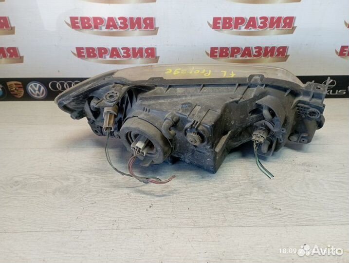 Фара передняя левая Mazda Protege BJ 2002
