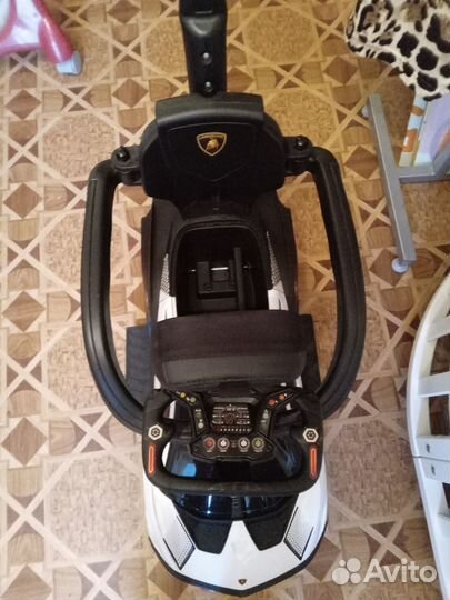 Детская машина каталка с ручкой(токолор)