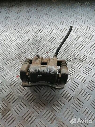 Суппорт тормозной задний левый Ssangyong Actyon