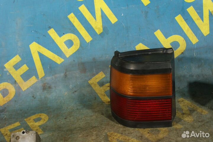 Задний левый фонарь универсал Volkswagen Passat B3