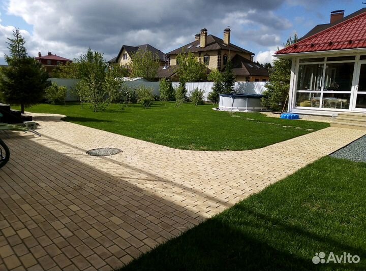 Укладка рулонного газона, и посев газона