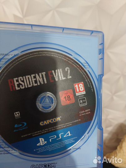 Диск на ps 4 Resident evil 2 remake