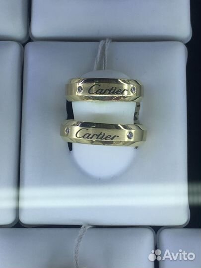 Золотые обручальные кольца с бриллиантами картиер