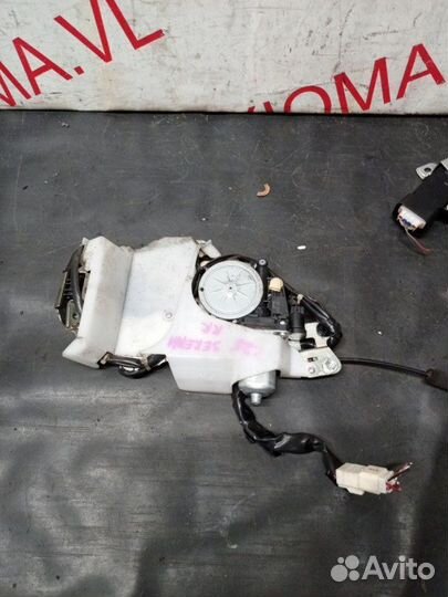 Замок двери прав. зад. nissan serena