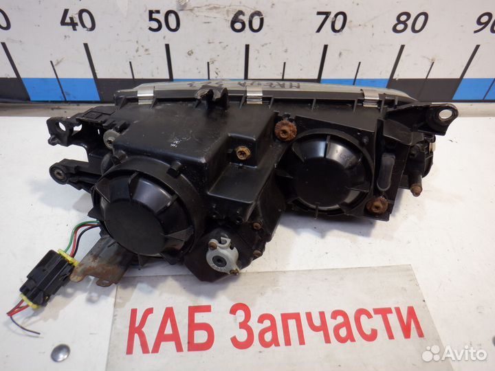 Фара левая Mazda 323