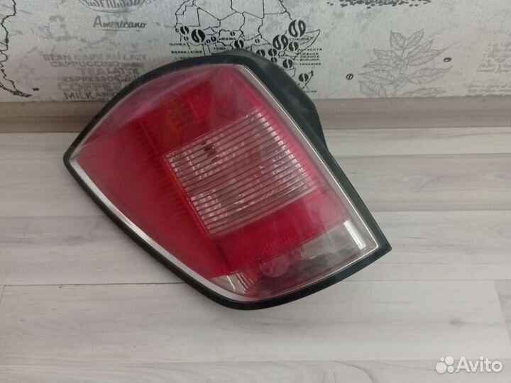 Фонарь задний левый Opel Astra H универсал