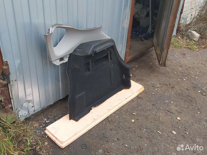 Обшивка багажника Opel Astra J