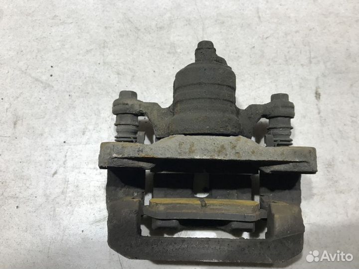 44001EB30A Суппорт задний R Nissan Pathfinder R51