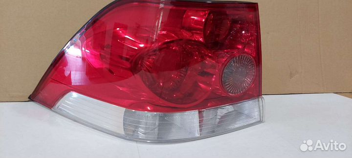 Фонарь левый Opel Astra H седан