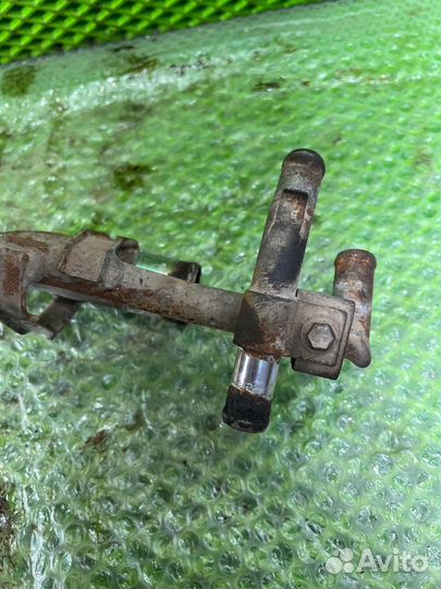 Корпус термостата Suzuki Liana