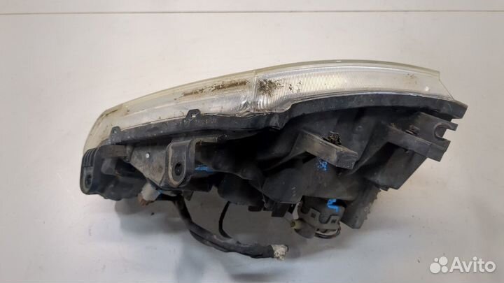 Фара (передняя) левая Nissan Navara