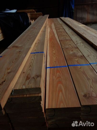 Домостроение с досками из лиственницы