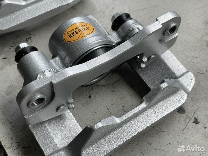 Суппорт задний Mitsubishi Pajero Sport