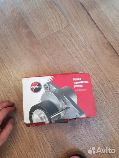 Натяжитель приводного ремня в сборе с роликом KIA