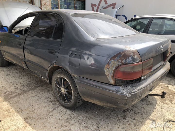 В разборе Toyota carina 1993г