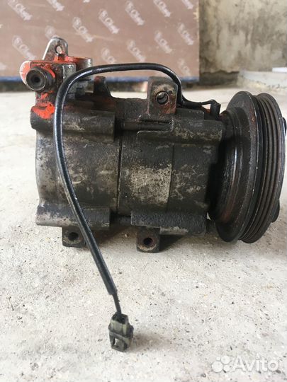 Компрессор кондиционера KIA Sephia