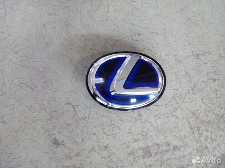Эмблема решетки радиатора Lexus RX 3 Hubrid