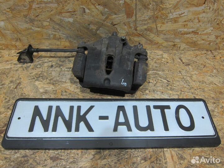 Суппорт тормозной передний Kia Sportage 3