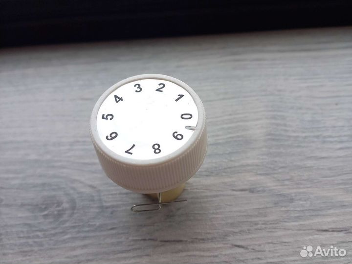 Регулятор натяжения нити