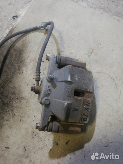 Суппорт передний левый Nissan X-Trail TNT-31 2.5