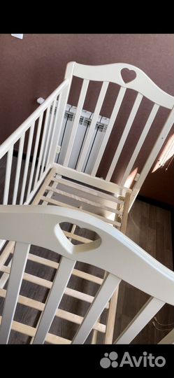 Детская кроватка с продольным маятником