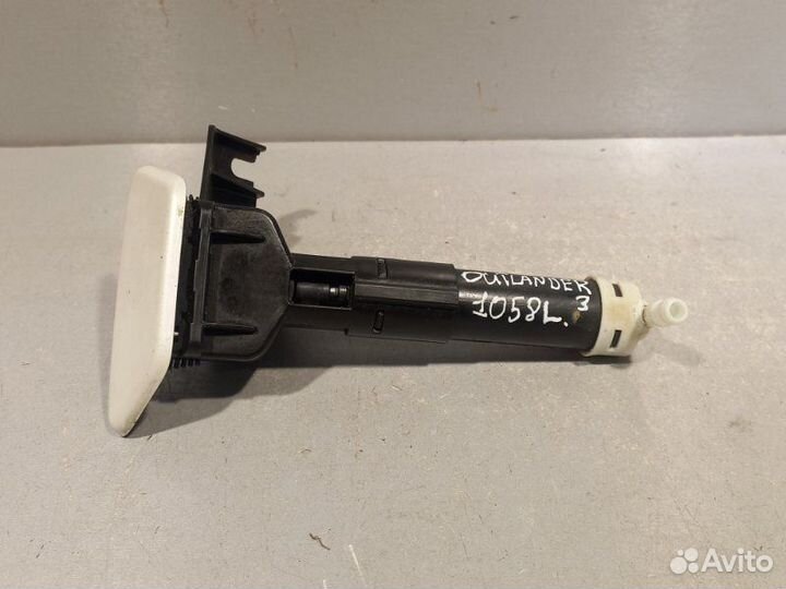 Форсунка омывателя фар левая Mitsubishi Outlander