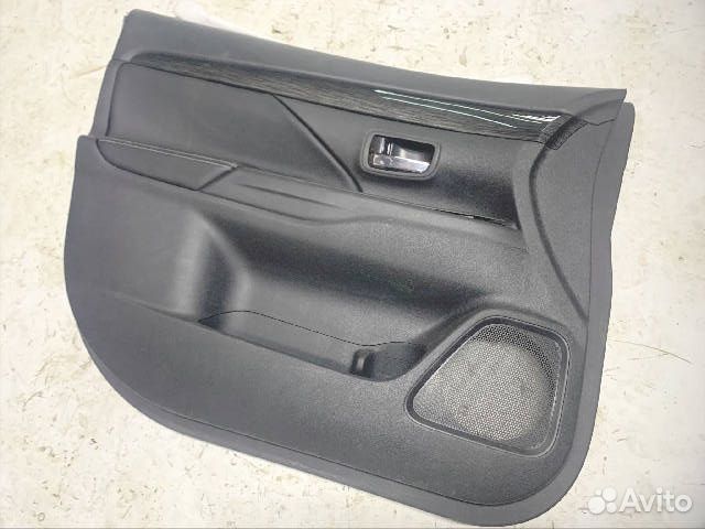 Обшивка двери передней левой Mitsubishi Outlander