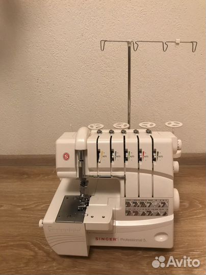 Коверлок Singer