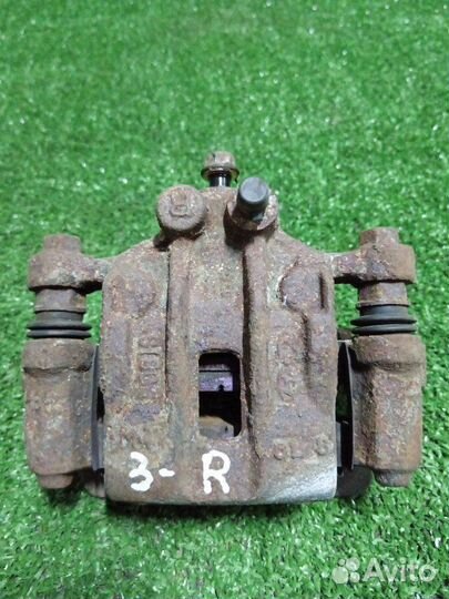 Суппорт тормозной задний правый Kia Optima JF G4ND