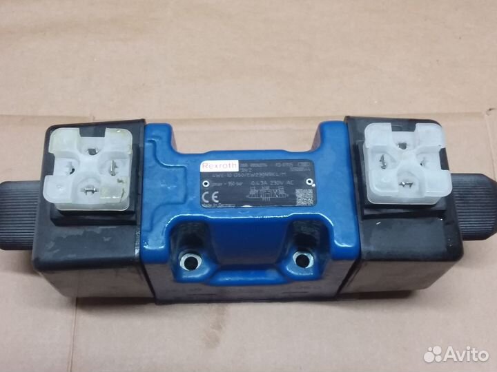 Клапан 4WE 10 G5X/EW230N9K4/M Rexroth R901487114