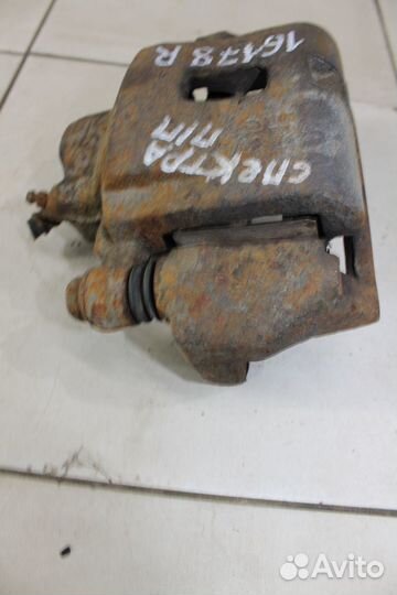 Суппорт тормозной Киа Спектра