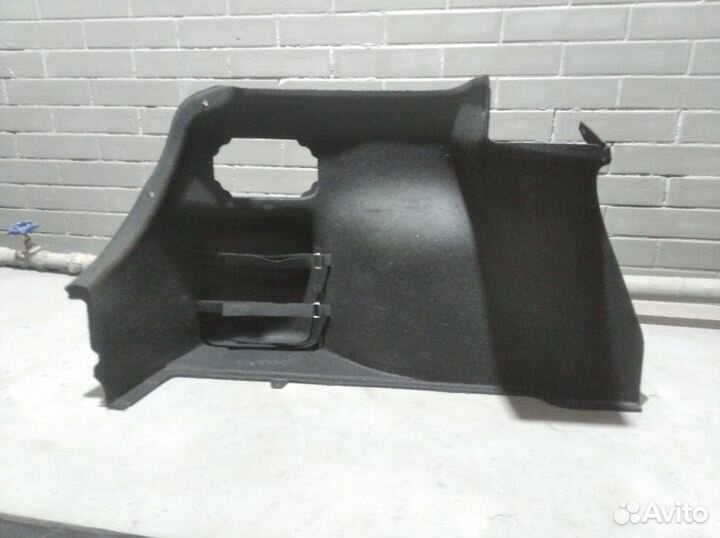 Обшивка багажника задняя левая Hyundai Solaris