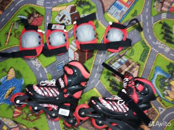 Роликовые коньки