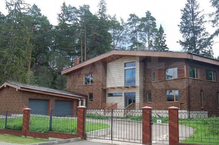 Коттедж 638 м² на участке 30 сот.