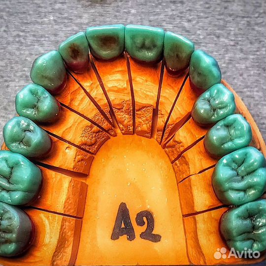 Зубной техник