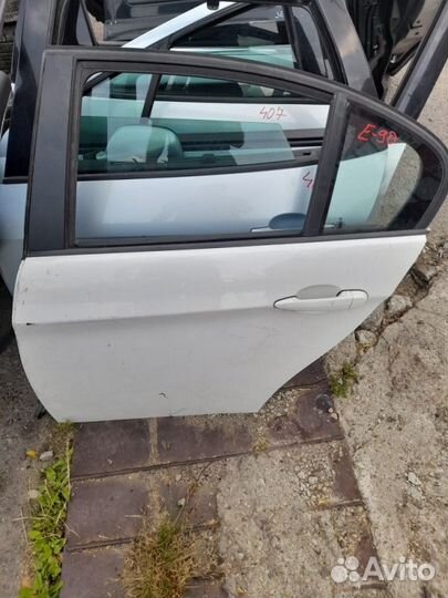 Дверь лев. зад. BMW 3