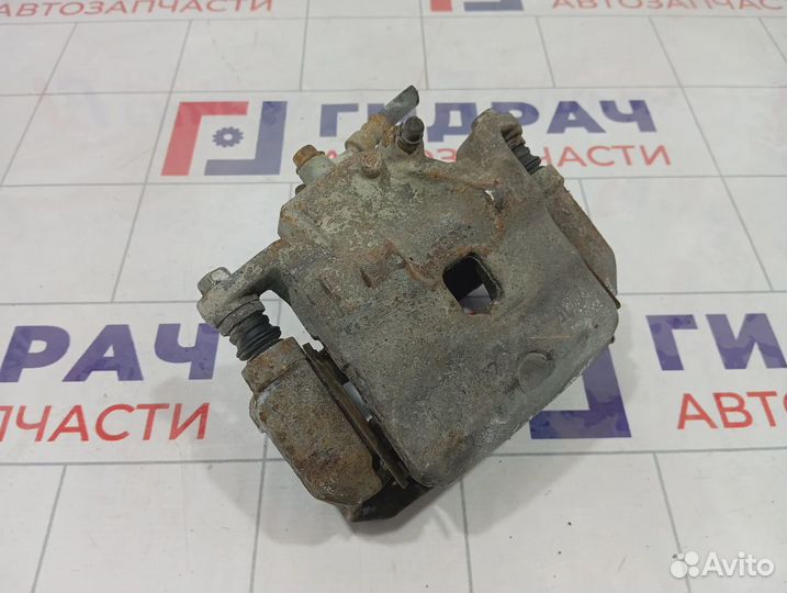 Суппорт тормозной передний левый Nissan Tiida (C11) 41011-EM10A