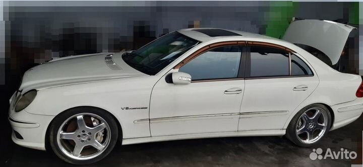 Форсунка омывателя фар левая Mercedes-Benz E320